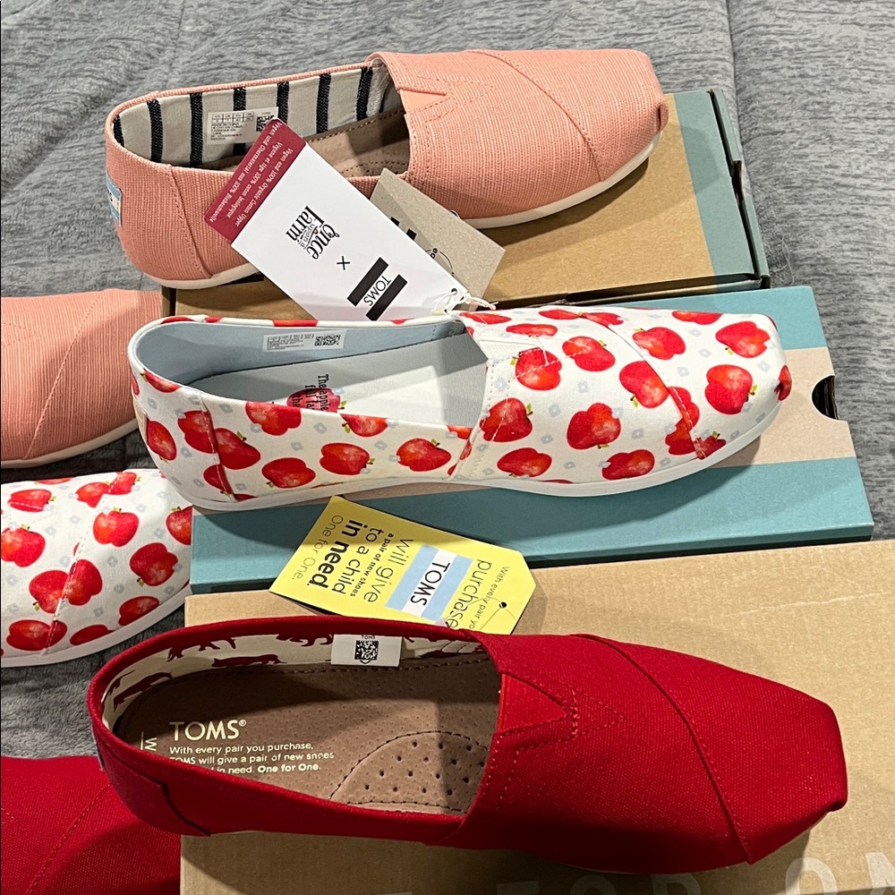Set of 3 pairs of new TOMS Red, peach, and  white/ red Slip-Ons